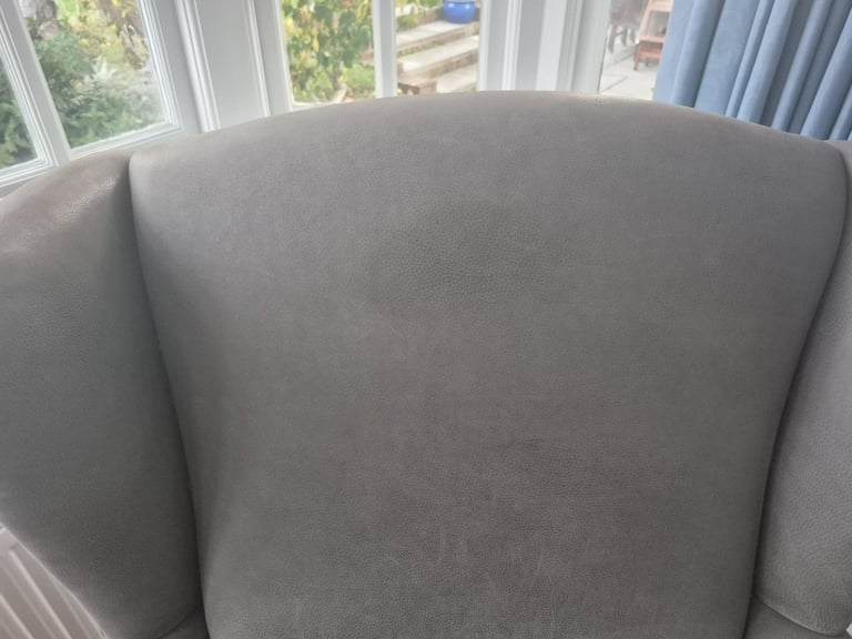 Wesley-Barrell Grey Leather Armchair