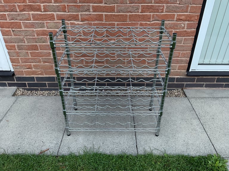 image for Wine rack holds 35 bottles new never used not enough space can deliver 