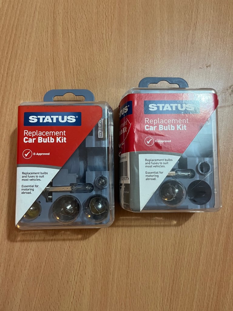 Two car bulb kits with bits used and missing 