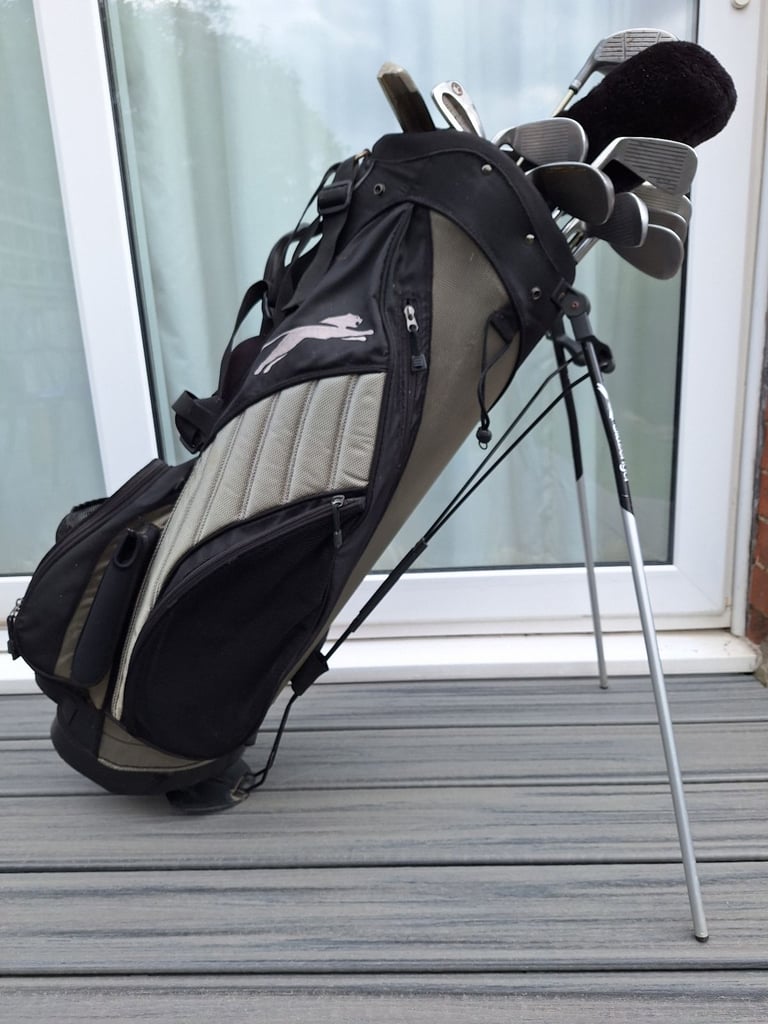 Set of Ladies, Right Handed Golf Clubs with golf bag/ stand and box of golf balls. 