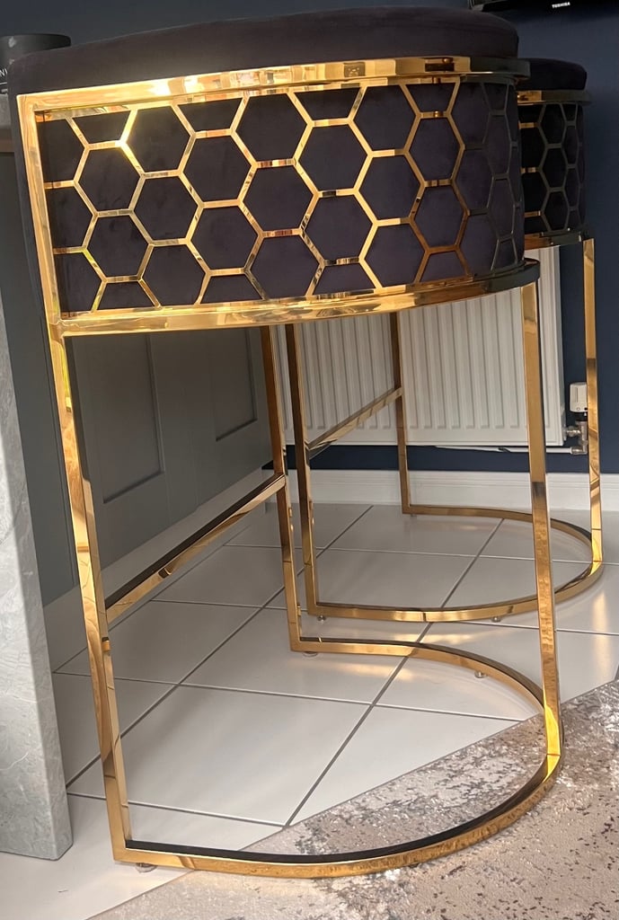 Black velvet and brass breaker bar stools 