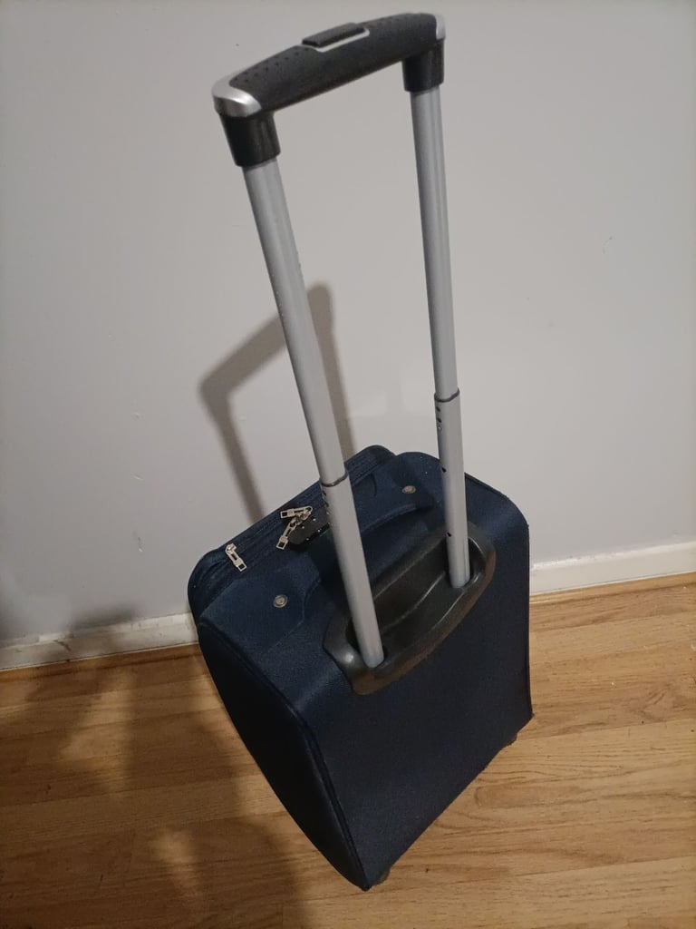 Suiss Polo Cabin luggage suitcase. Used once. 52cm x 34cm x 25cm. Dark blue. Includes new padlock 