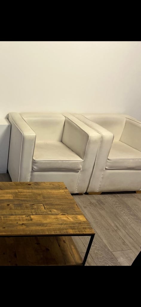 image for 2 ivory leather seats 