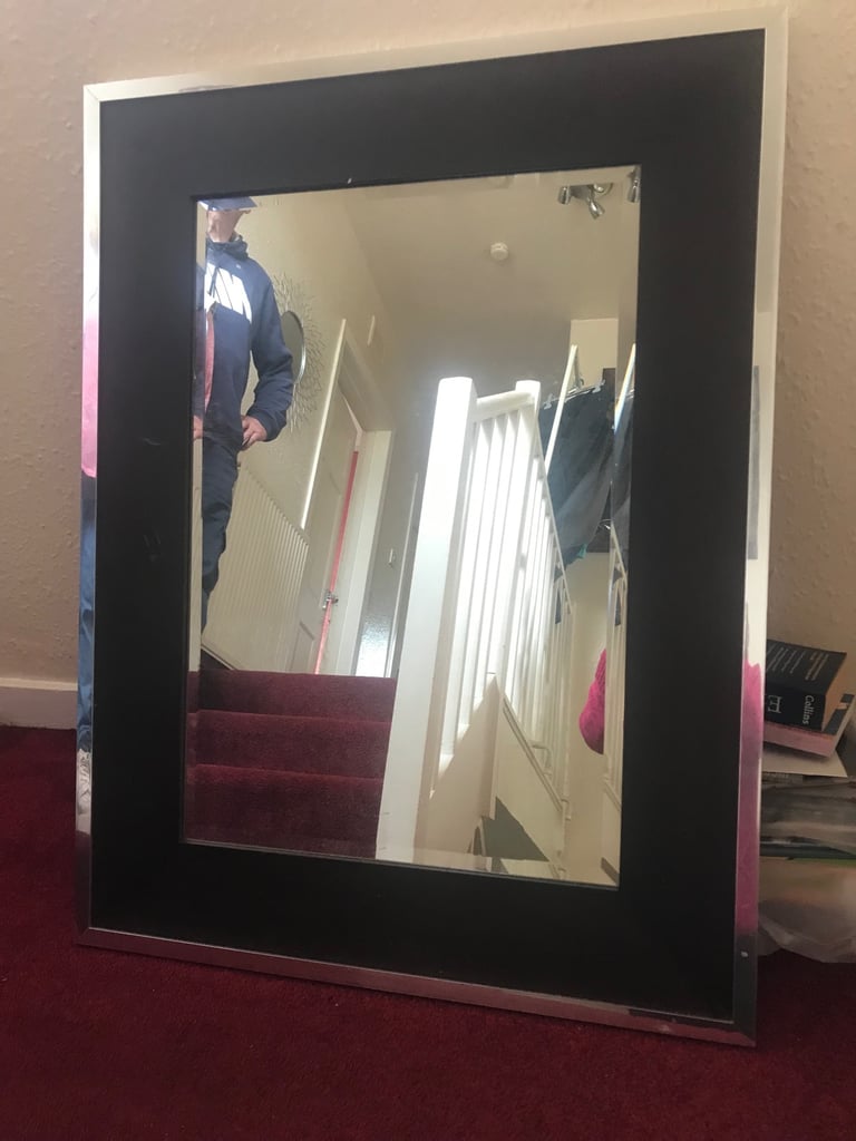 Mirror, large and heavy with chrome surround.