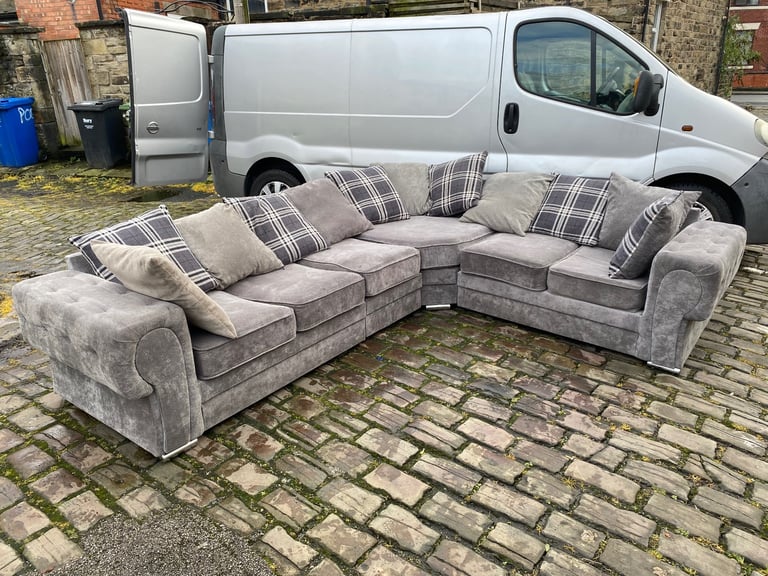 6 seater grey corner sofa Available 