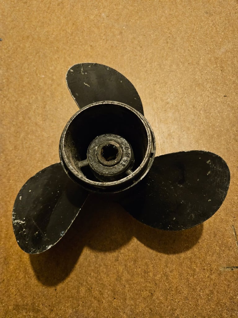 Evinrude outboard propeller. 8" diameter 