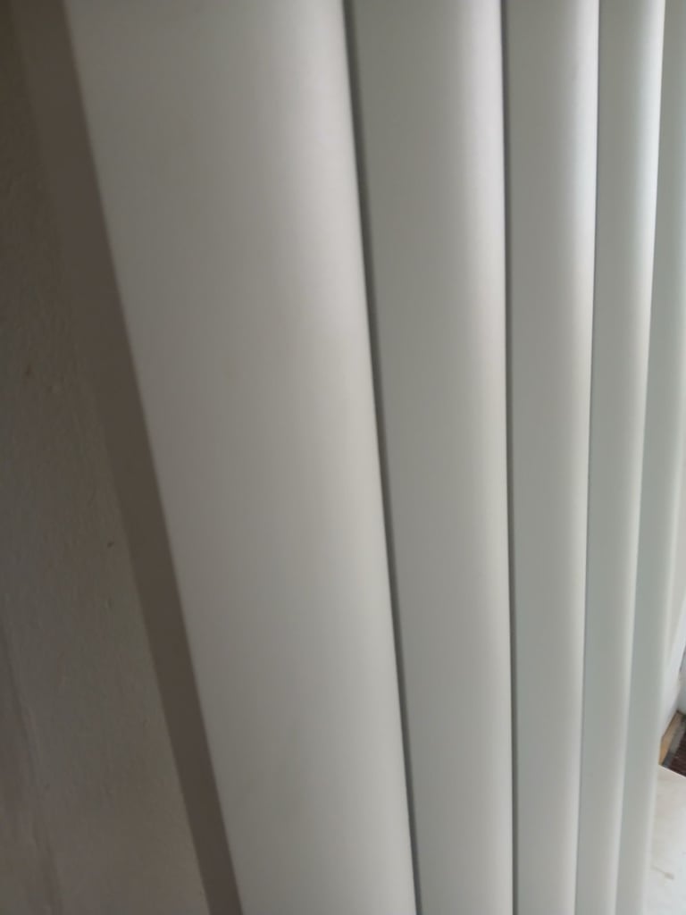 Vertical white dome radiator 