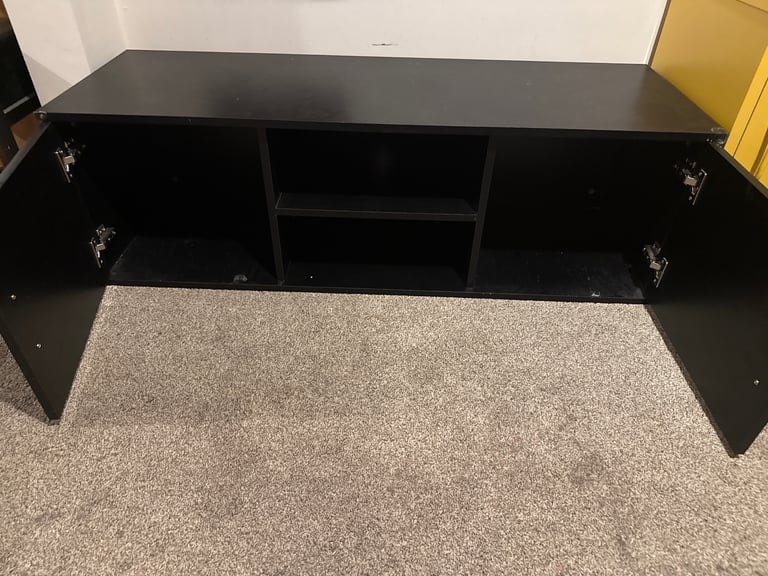 Free under tv cabinet.