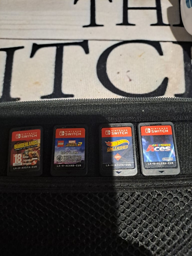 Nintendo switch lite with games and headset