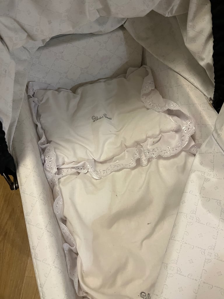 Children’s silver cross pram