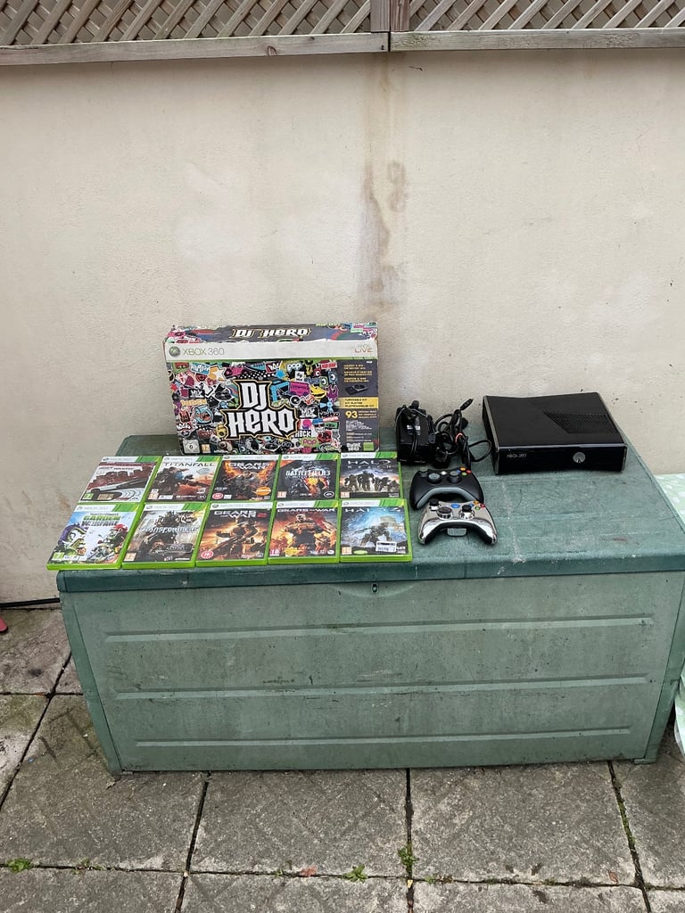 image for Xbox 360s console bundle with two controllers & Xbox 360s DJ hero turntable & ten games & more 