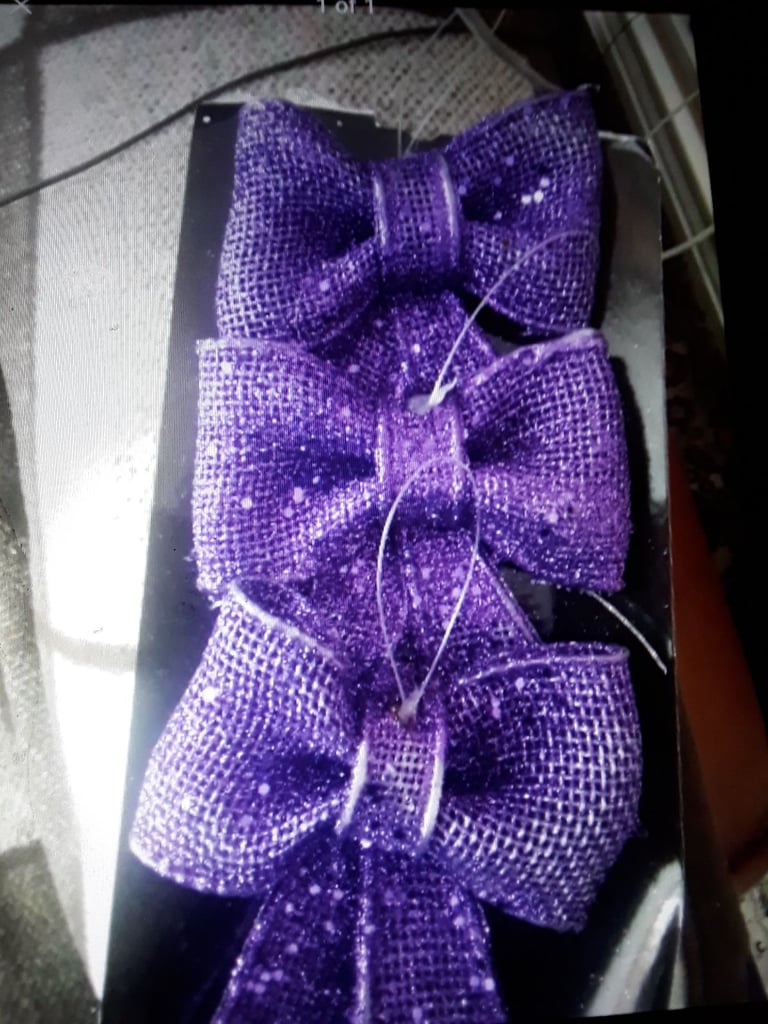 3 purple bows 