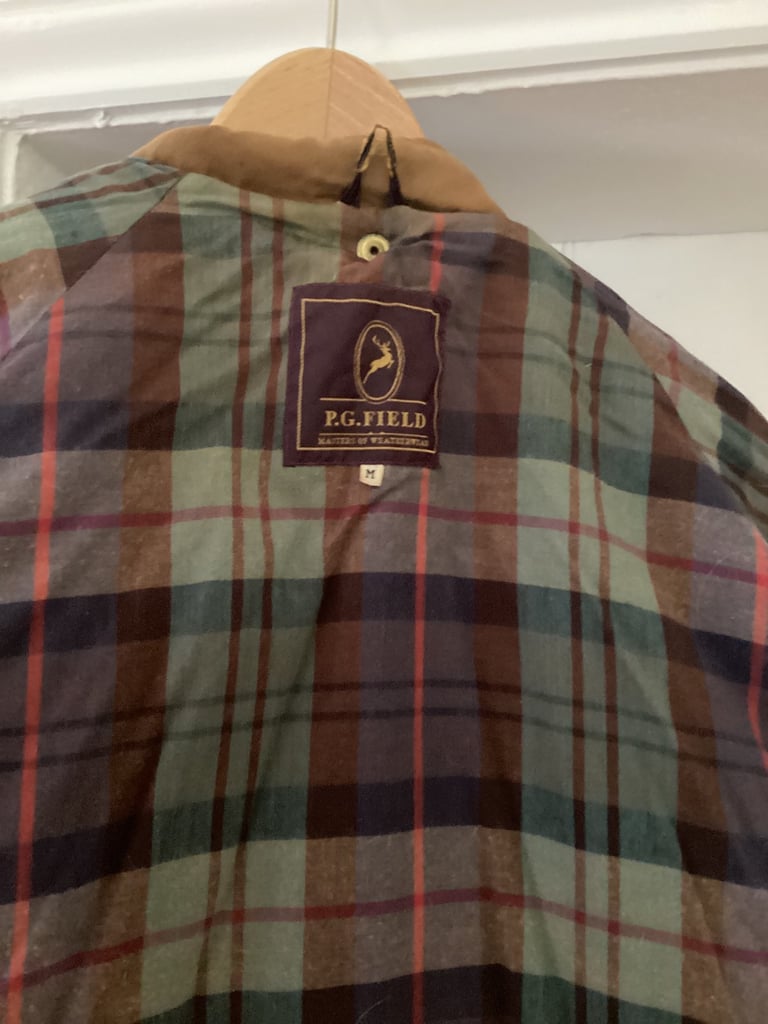 Waxed riding coat with cape