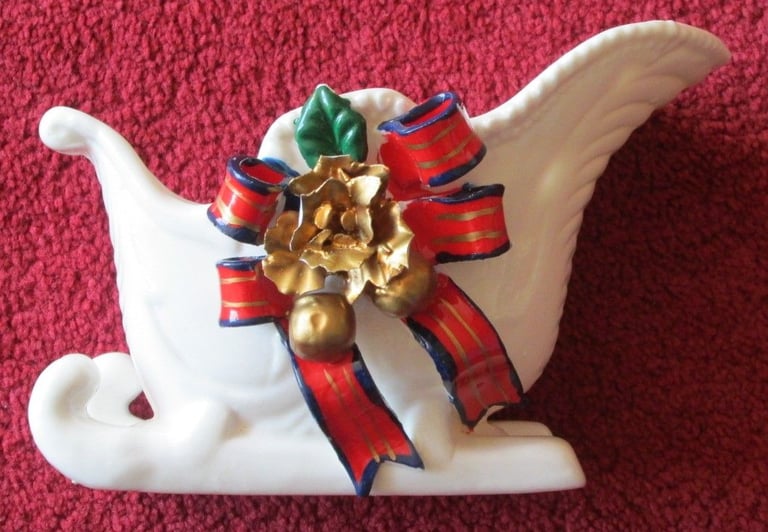 White china ornament - SLEIGH WITH BOW HOLLY AND RIBBON 7 X 4 
