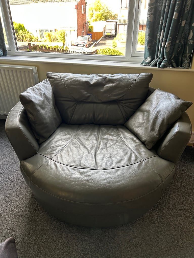 Large grey swivel chair