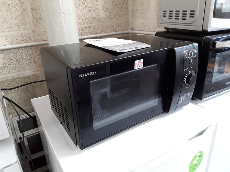 image for Black Sharp YCGG02 microwave oven & grill Low Cost Moves 2nd Hand Furniture STALYBRIDGE SK15 3DN
