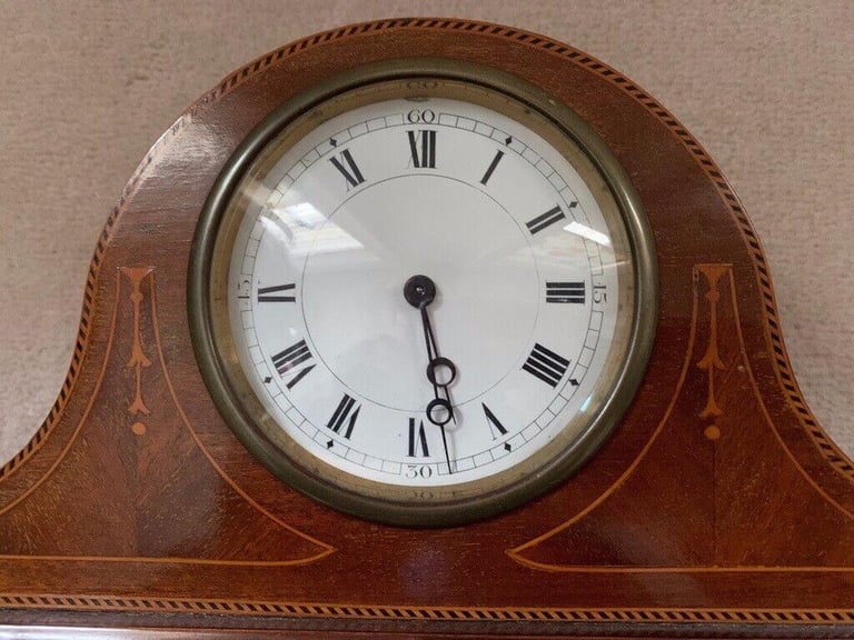 Mahogany mantelpiece clock with beautiful inlay