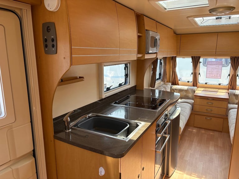 BAILEY OLYMPUS 525- 5 BERTH CARAVAN,DOUBLE DINETTE + MOTORMOVER