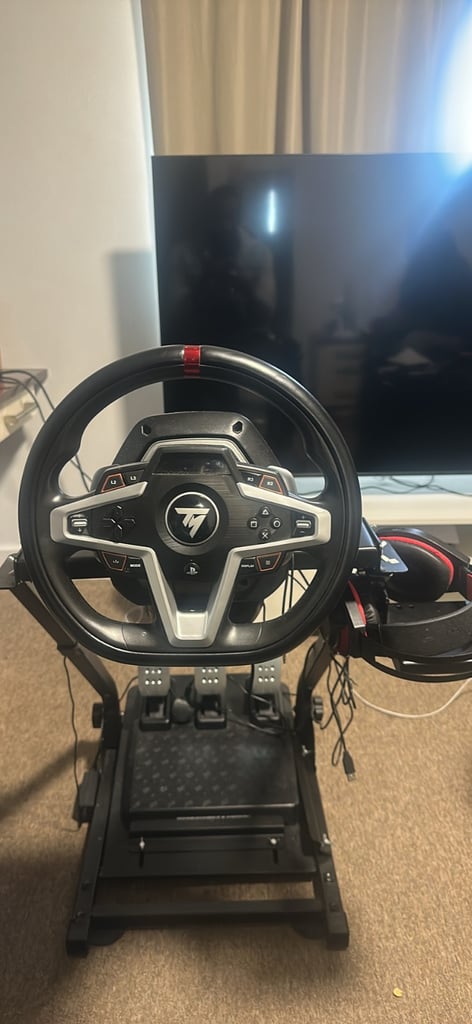 image for Thrustmaster racing wheel with stand + free head phone