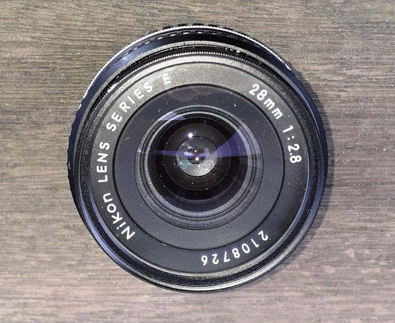 Nikon FE SLR Camera + accessories