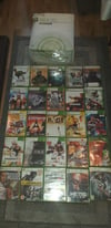xbox 360 with box 1 controller and 76 games 