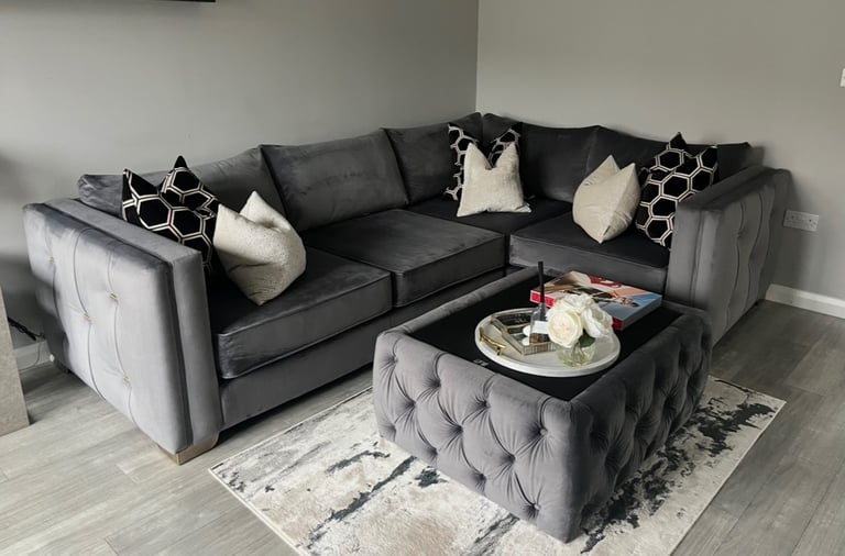 Grey velvet corner sofa and table 