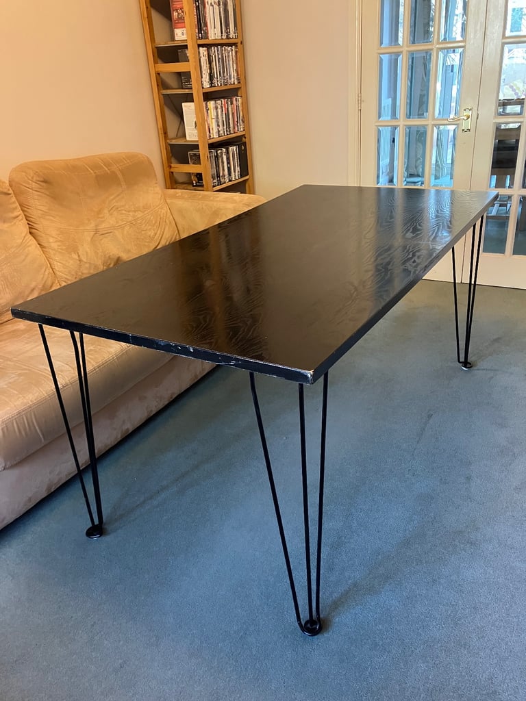 IKEA black veneer table with black steel legs