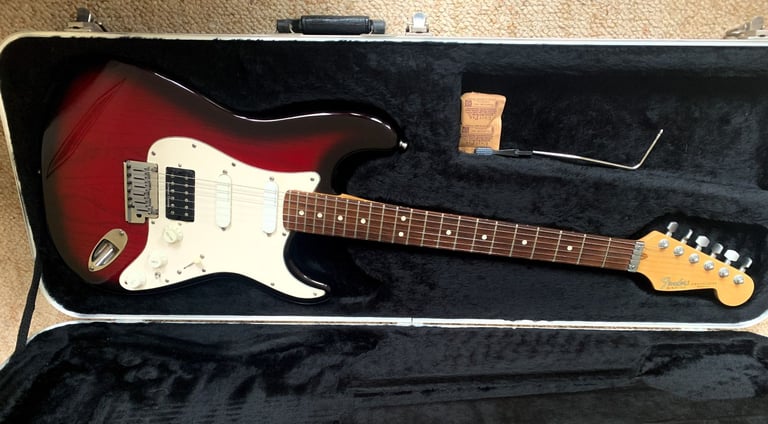 Fender Stratocaster. 1990 Strat Plus Deluxe. American. Rosewood. Crimson. Exceptional.