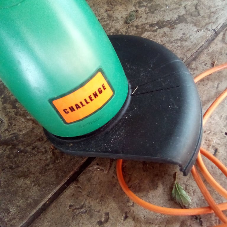 Challenge garden strimmer, used once, as new, cuts great