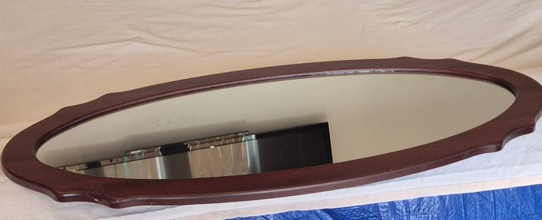 Oval mahogany mirror 