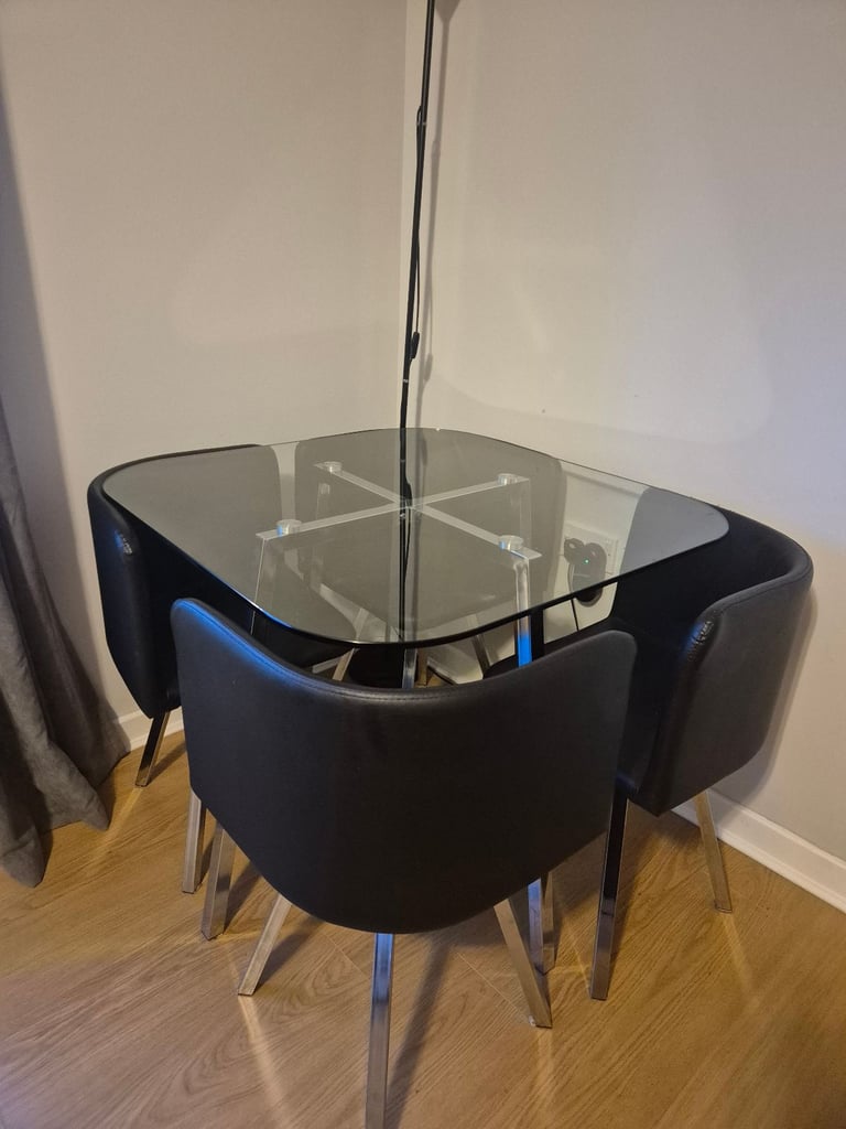 image for Argos glass table and four chairs