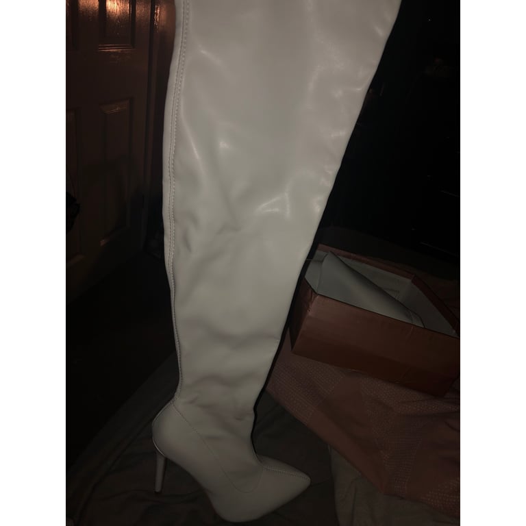 White knee high boots 