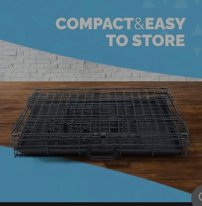 A new still boxed 42-Inch Dog Cage Crate Heavy Duty Black Metal Folding w/ 2 Doors 