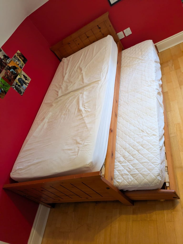 Single bed with trundle guest bed stored under
