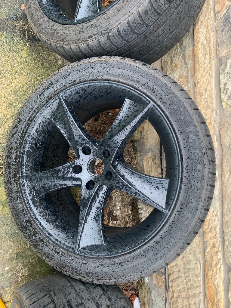 4 Black alloys with winter tyres for BMW X6 or similar