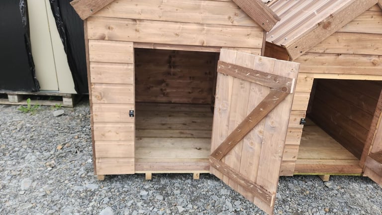Timber dog kennels with tin roof 