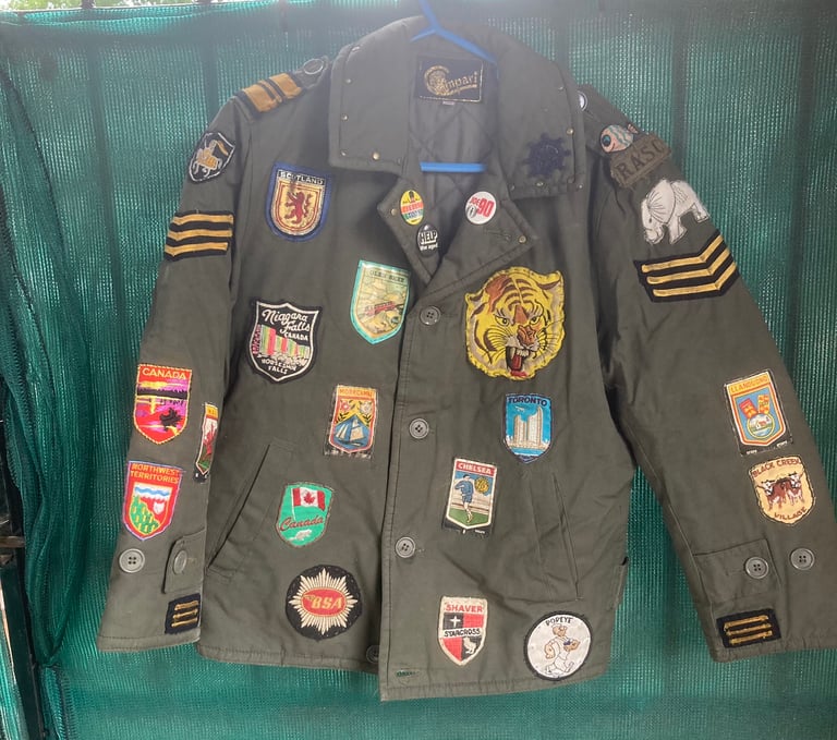 Vintage khaki Campari jacket and sew on badges