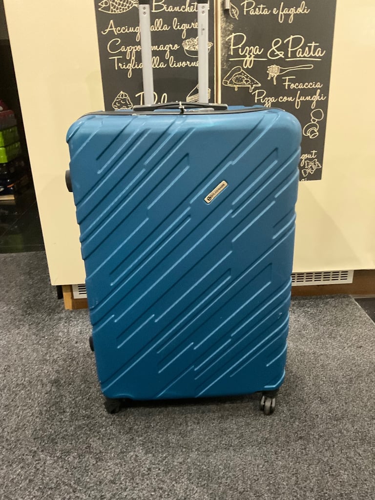 Used suitcase ATLASBAGS size 75x48x£29cm blue 4 wheels v.good condition £28