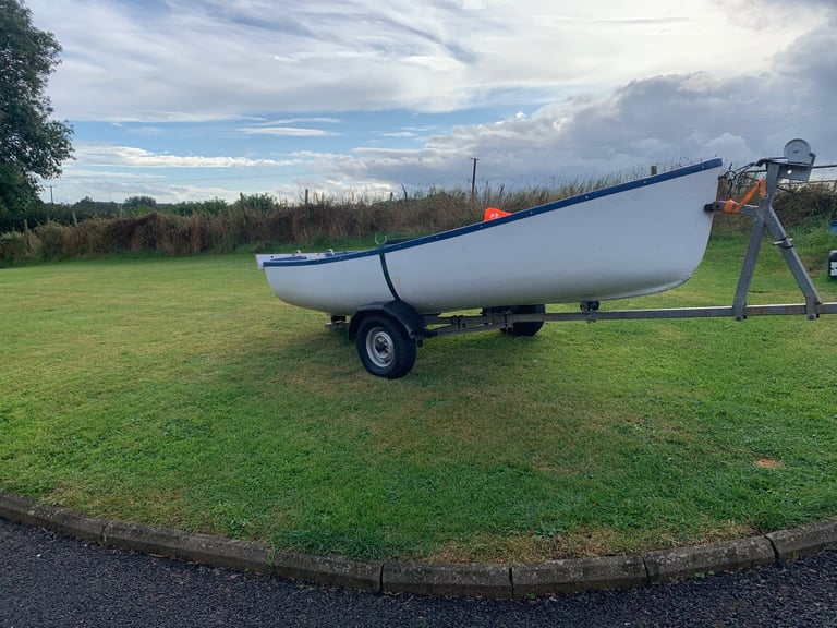 12 ft fibreglass boat and galvanised trailer 