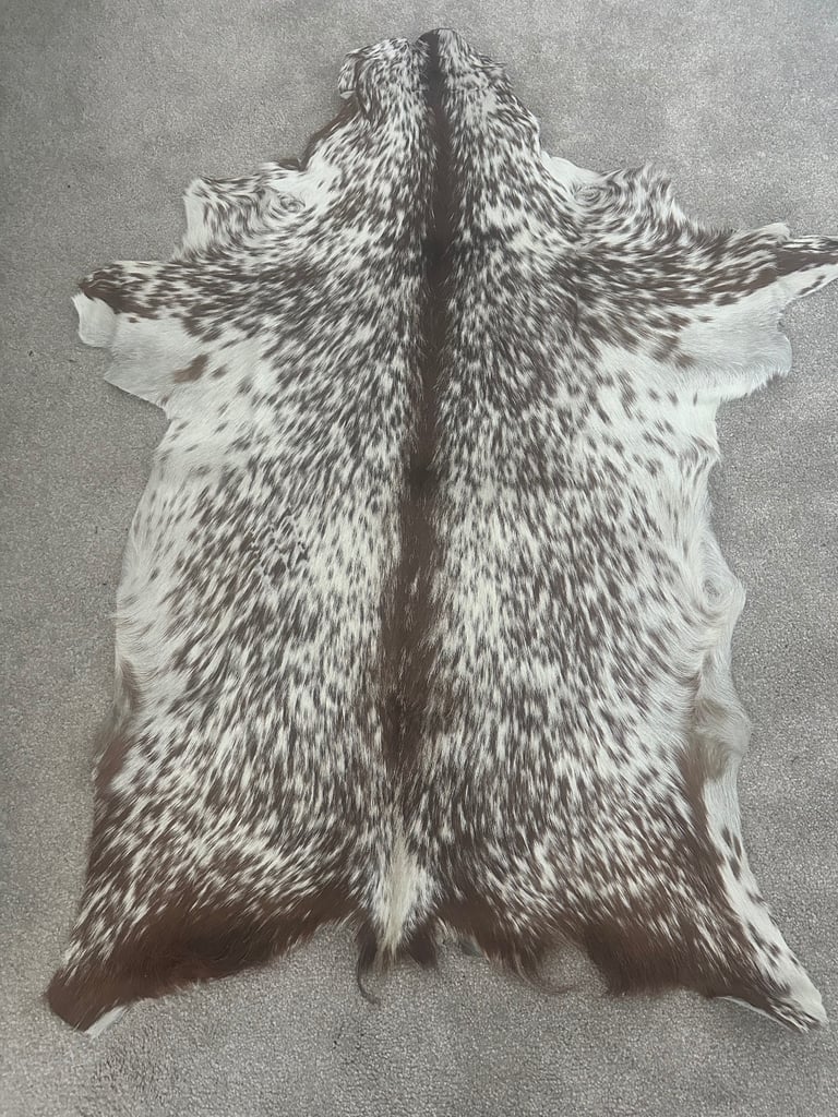 image for Beautiful 100% genuine goat hide rug. Brand new. 