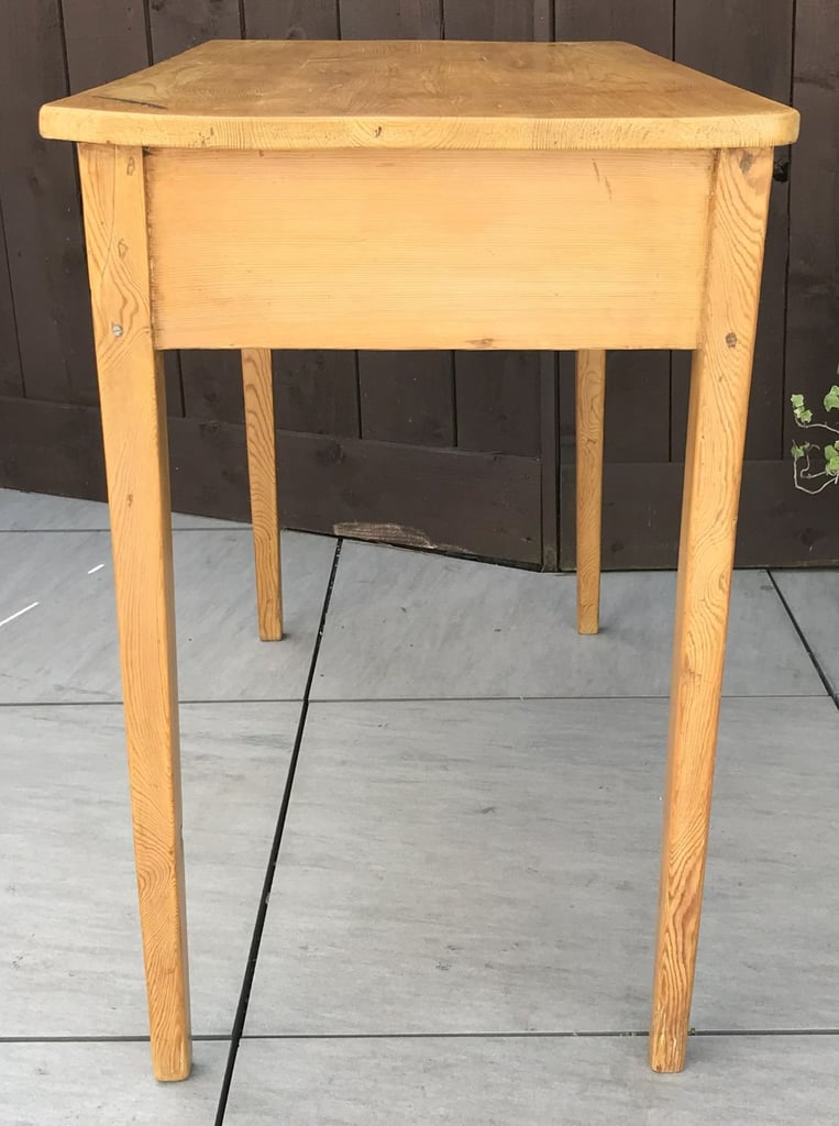 A VICTORIAN PINE SIDE TABLE