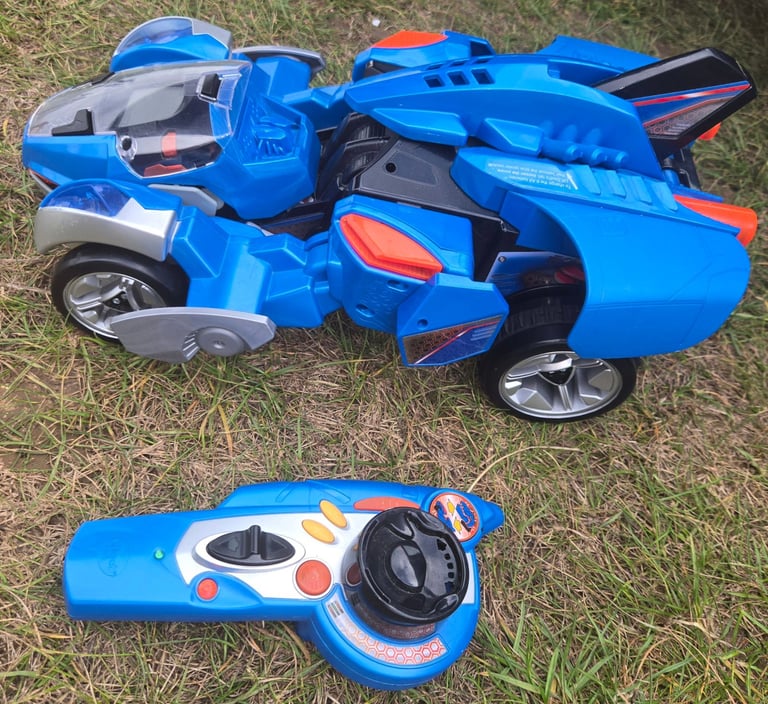 image for Vtech switch n go dino toy with remote control 