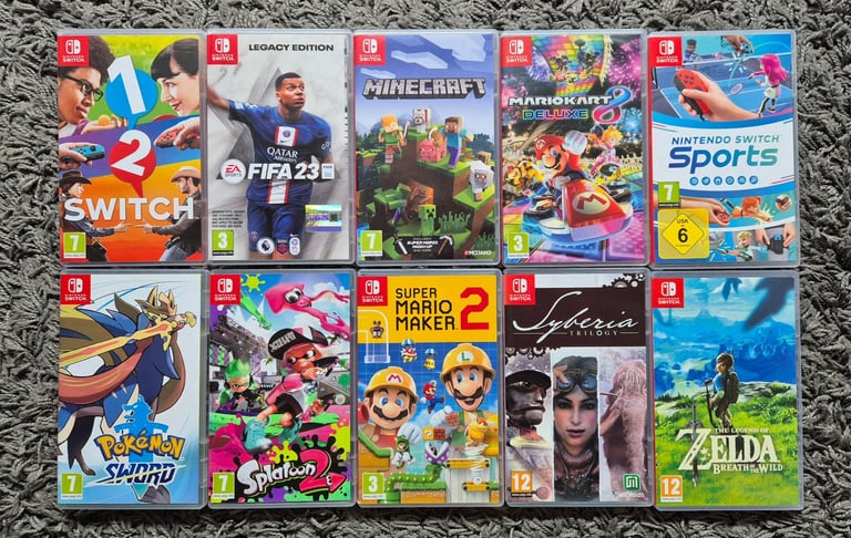Nintendo Switch Grey with extra controller and 10 games.