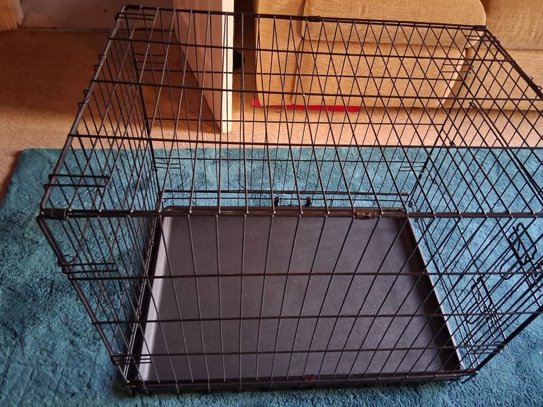 Dog cage, folding, in good condition