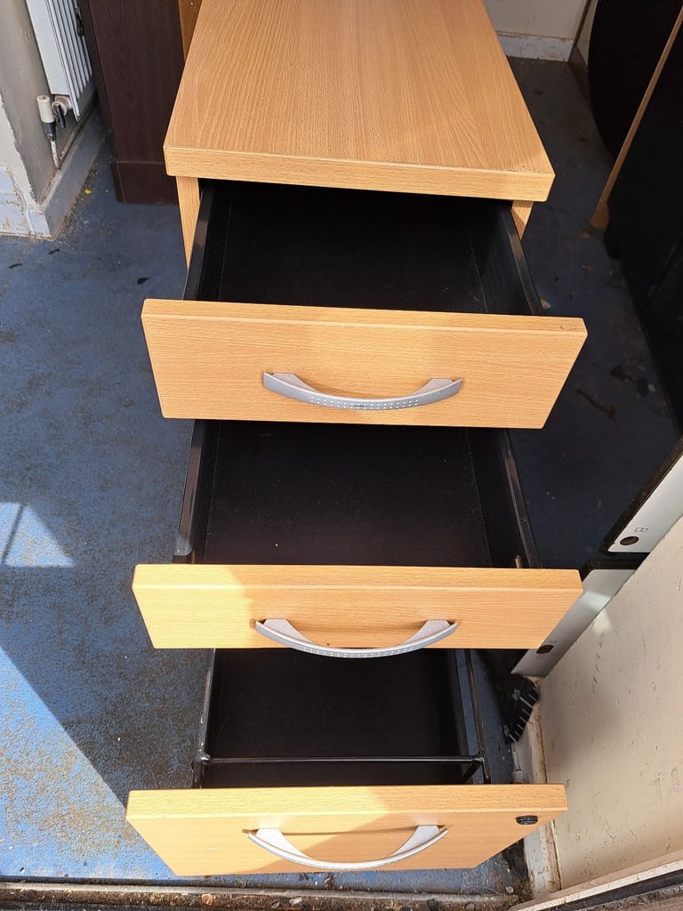 light brown wood 3 door filling cabinet