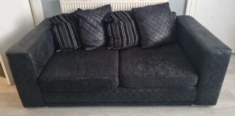 Black 2 seater sofa and matching swivel sofa