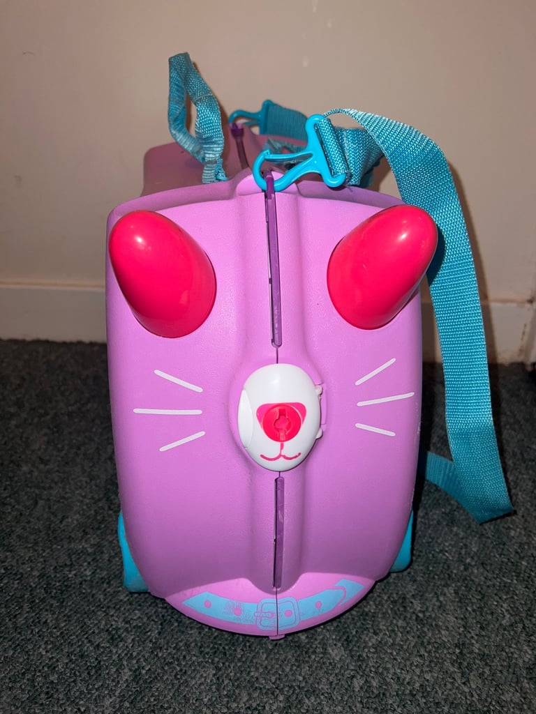 Used kids Purple Trunki Ride on 