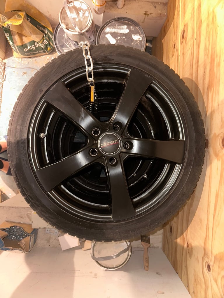 image for 18” black Alloy wheels for BMW with good winter tyres.