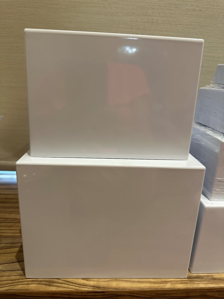 6 white acrylic buffet risers / display stands 