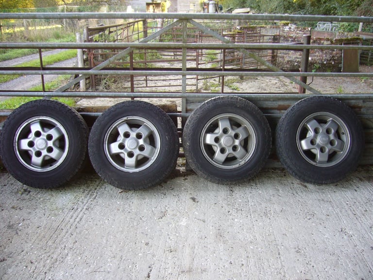 Four Land Rover alloy wheels